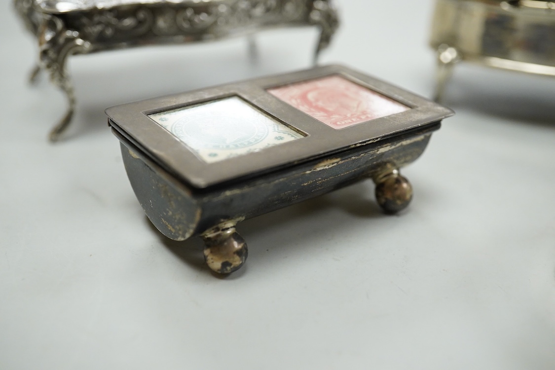 A George V silver mounted oval trinket box, Clark & Sewell, Chester, 1924, 65mm, together with a small silver circular pill box and cover, a 925 double stamp box, and a late Victorian continental silver miniature model o
